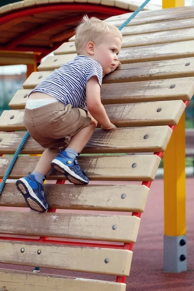 Anxious Child Trying Fall Climbing Wall Playground Strong Brave Boy — Fotografia de Stock