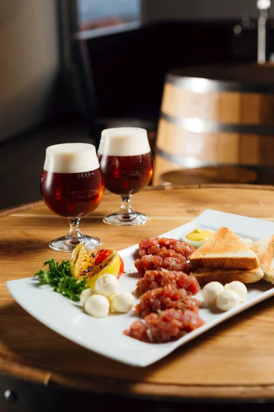 A great snack and beer for friends in a pub