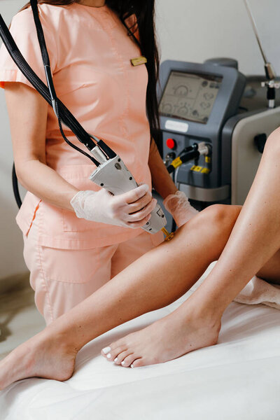 Laser hair removal procedure in a clinic