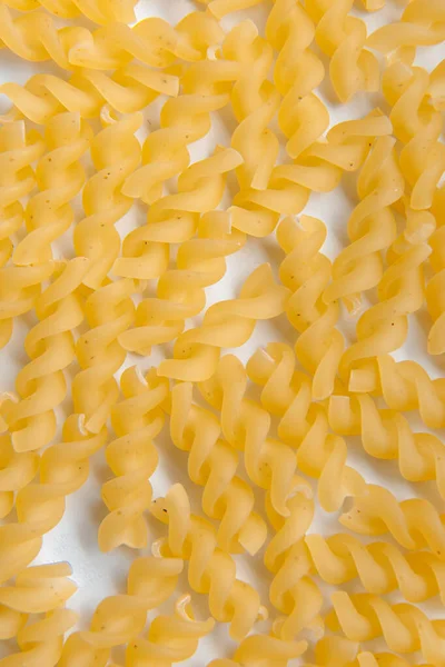 Ungekochte Fusilli Pasta Auf Weißem Hintergrund Perfekte Zutat Für Das — Stockfoto