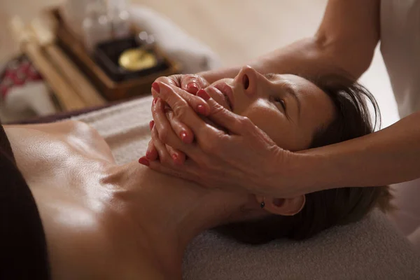 Unrecognizable Professional Cosmetician Doing Face Massage Mature Woman Working Spa — Stock Photo, Image