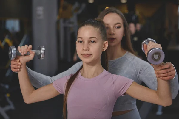 Lovely Teenage Girl Lifting Dumbbells Exercising Professional Female Athlete Gym — Fotografia de Stock