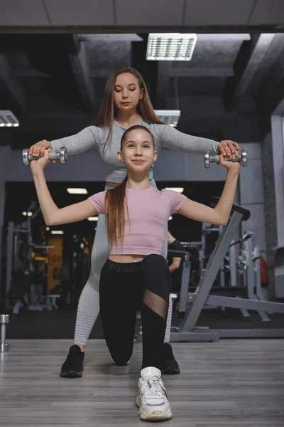 Vertical Full Length Shot Teen Girl Doing Lunges Weights Personal — Fotografia de Stock