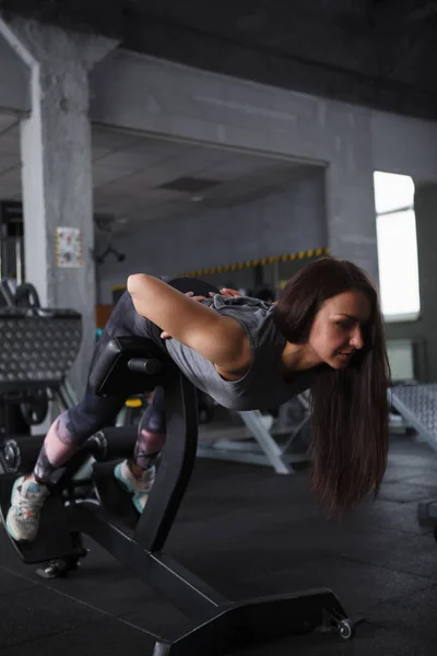 Vertical Shot Female Athlete Working Out Doing Hyperextension Back Buttocks — ストック写真