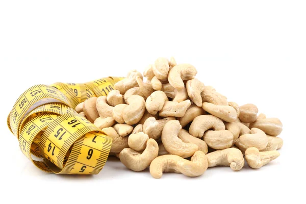 Cashew (nut) and meter — Stock Photo, Image