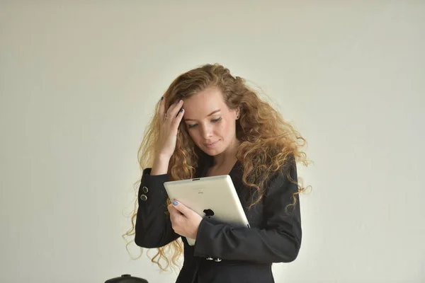 Woman in formal wear with laptop computer