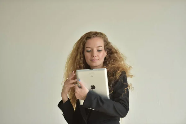 Woman in formal wear with laptop computer