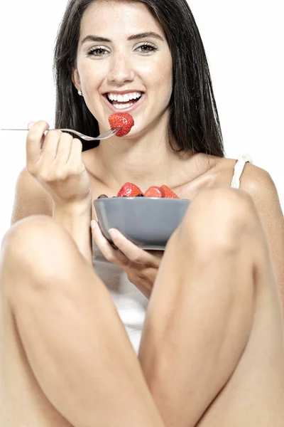Woman eating breakfast at home — Stock Photo, Image
