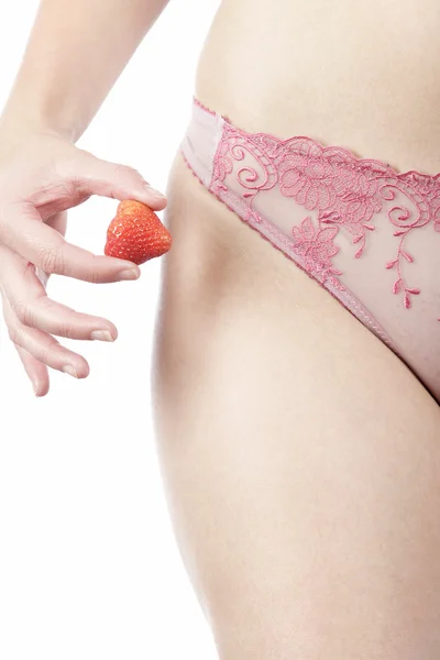 Fianchi e vita della donna in biancheria intima rosa — Foto Stock