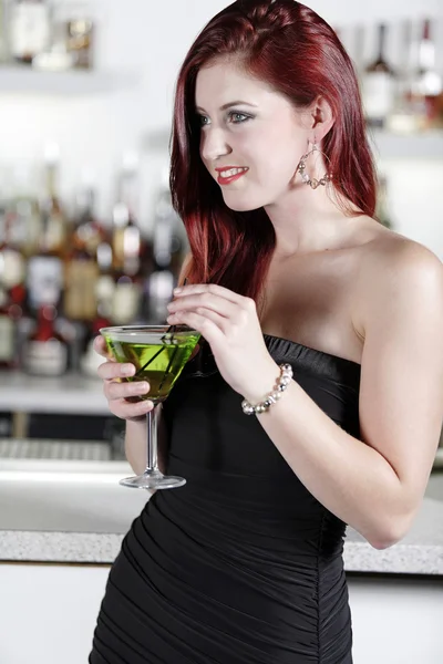 Woman enjoying a cocktail — Stock Photo, Image