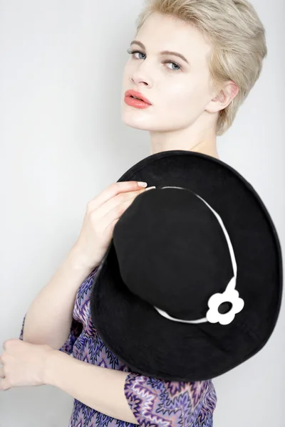 Woman with black hat — Stock Photo, Image