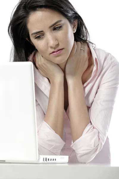 Woman with neck pain at desk — Stock Photo, Image