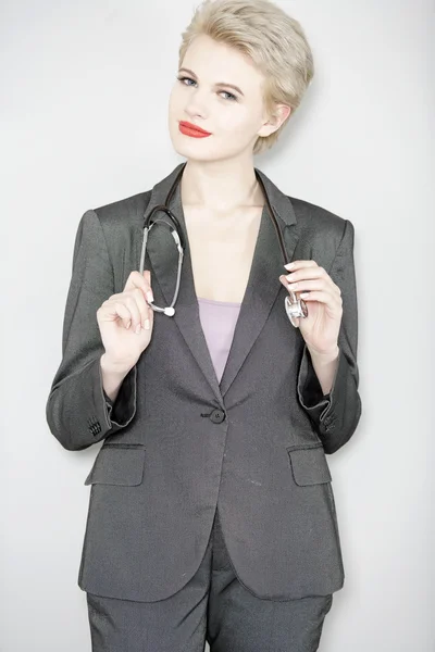 Female doctor in smart suit — Stockfoto