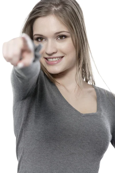 Kvinna som pekar på vit — Stockfoto