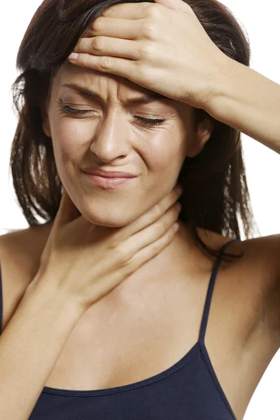 Frau mit Kopfschmerzen — Stockfoto