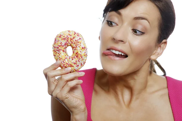 Woman with doughnut — Stock Photo, Image