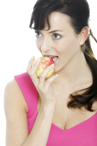 Frau hält einen Apfel in der Hand — Stockfoto