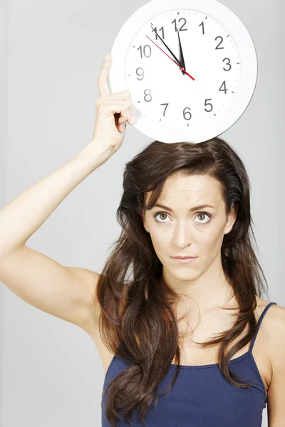 Woman with clock — Stock Photo, Image