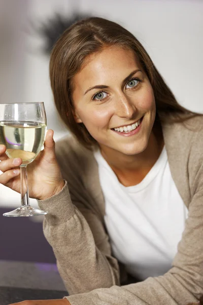 Woman enjoying a glass of wine Royalty Free Stock Photos