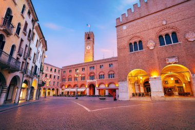 Treviso, Italy. Cityscape image of historical center of Treviso, Italy with old square at sunrise. clipart