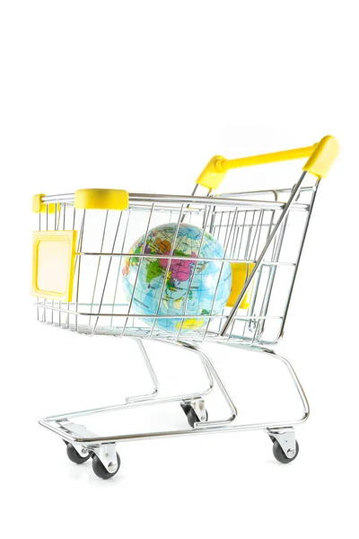 Globe model in shopping cart on white background — Stock Photo, Image