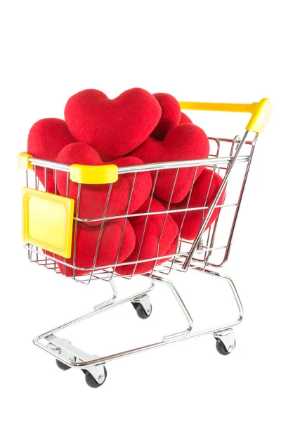 Many red hearts in shopping cart — Stock Photo, Image