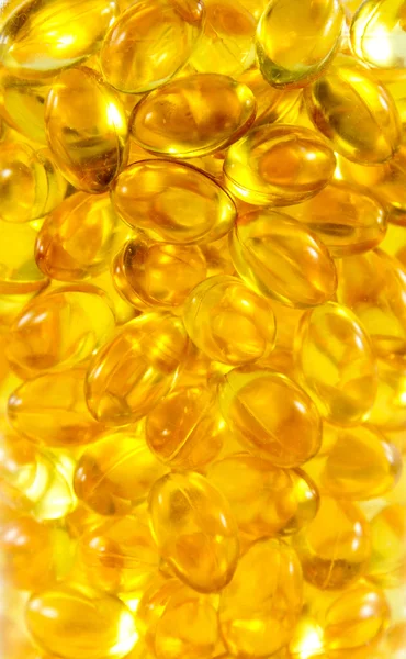 Texture capsules of fish oil — Stock Photo, Image