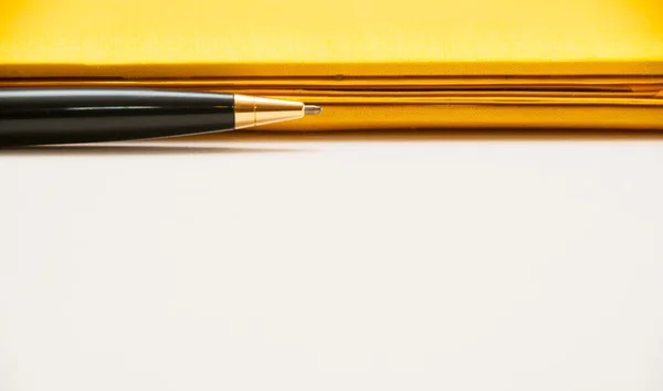 Luxury pen on yellow contract closeup — Stock Photo, Image