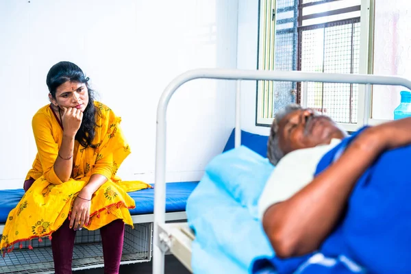 Worried Daughter Sitting Sleeping Sick Hospitalized Senior Father Concept Family — Φωτογραφία Αρχείου