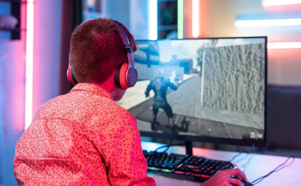 Shoudler Shot Teenager Kid Headphones Playing Online Video Game Computer — Fotografia de Stock