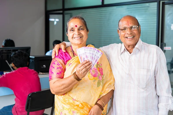 Happy Smiling Senior Couple Showing Indian Money Currency Notes Looking — 图库照片