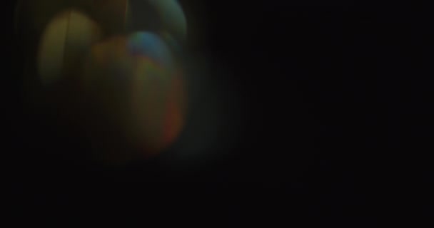 Organische anamorfe gekleurde lens knippert — Stockvideo