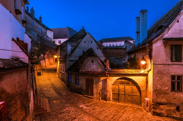 Old town alley and walls at night — Stock Photo, Image