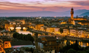 Night view over Arno river in Florence, Italy clipart