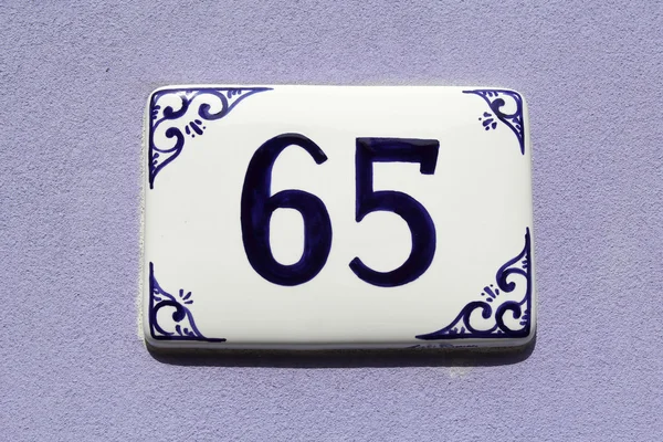 Number sixty-five, house address plate number — Stock Photo, Image