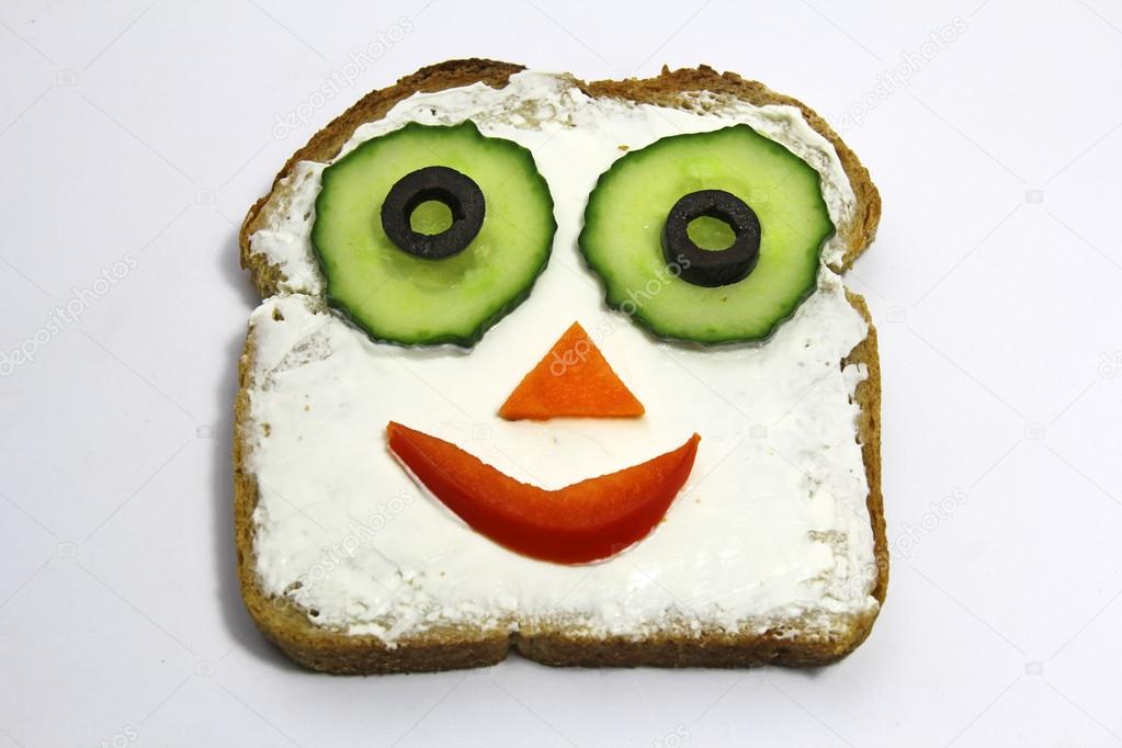 Smiling sandwich for kids, face on bread