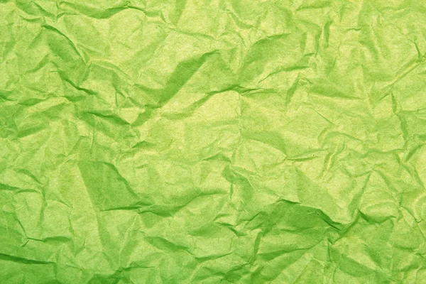 緑のしわくちゃの紙の背景 — ストック写真