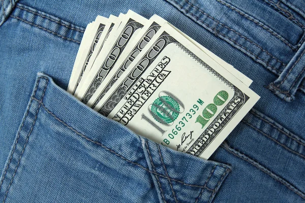 One hundred dollar bills in jeans pocket — Stock Photo, Image