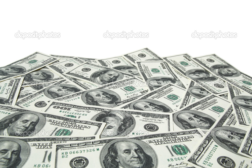 One hundred dollar bills on white background