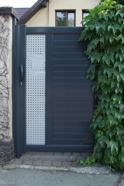 Black, modern entrance door — Stock Photo, Image