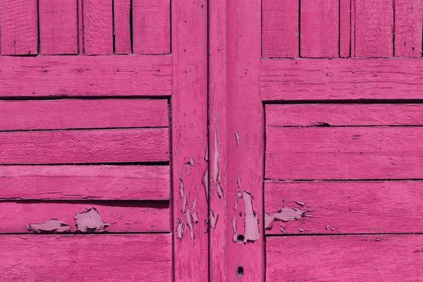 Closeup of old pink wooden door — Stock Photo, Image