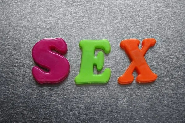 Σεξ διατυπώνονται χρησιμοποιώντας χρωματιστές μαγνήτες — Φωτογραφία Αρχείου