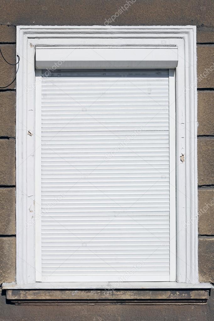 White window with roller shutter