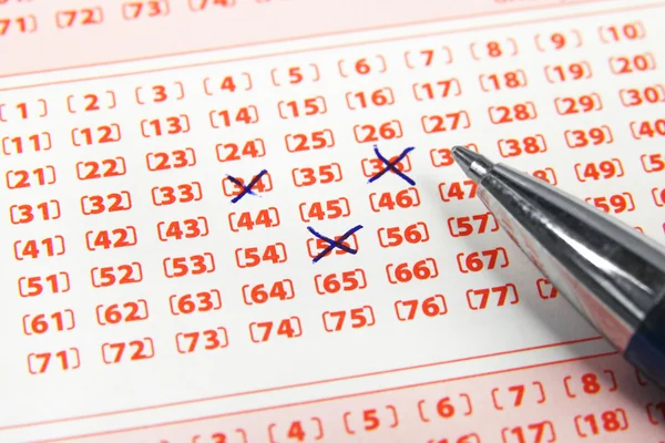 Lottery ticket and pen — Stock Photo, Image