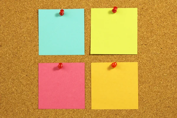 Four blank note card on a cork board — Stock Photo, Image