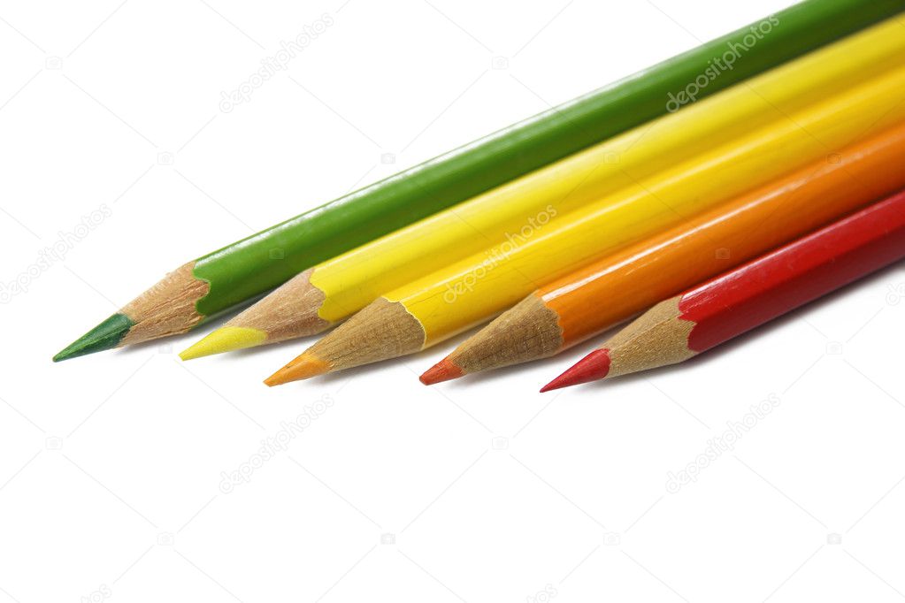 Colorful pencils in a row on white background