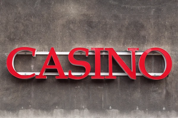 Signo de casino en pared vieja — Foto de Stock
