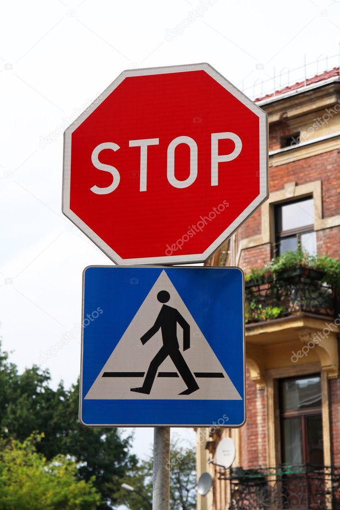 Stop sign with pedestrian crossing sign