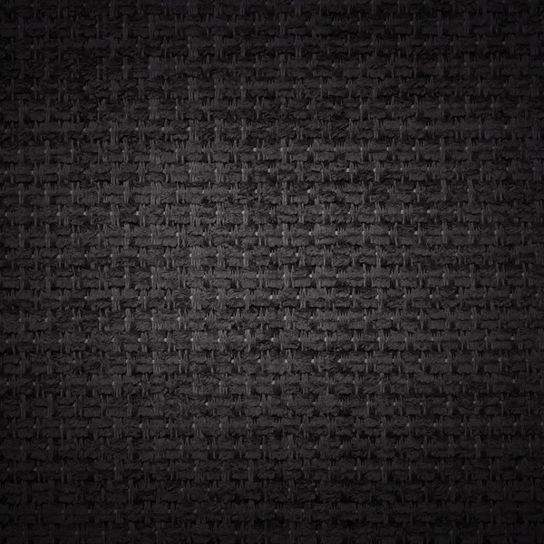 Zwarte stof achtergrond of textuur — Stockfoto
