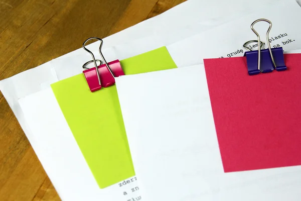 Documents with colorful paper clip and blank note card — Stock Photo, Image